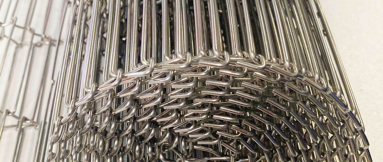 Oven conveyor belt rolled up