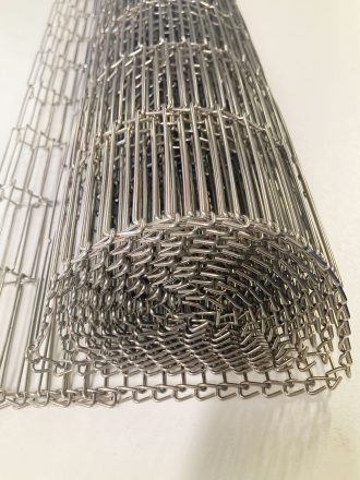Oven conveyor belt rolled up